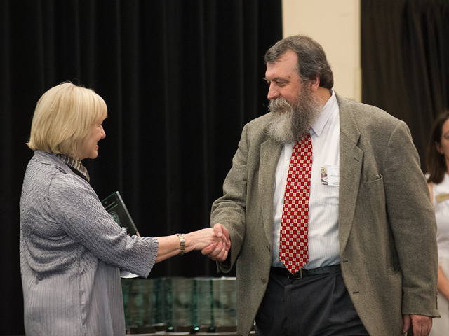 <span style="font-size:10px"> Dr. Rodgers receives his award </span>